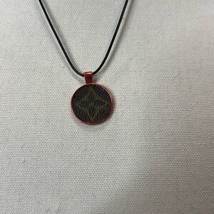 Necklace with upcycled Louis Vuitton monogram charm
